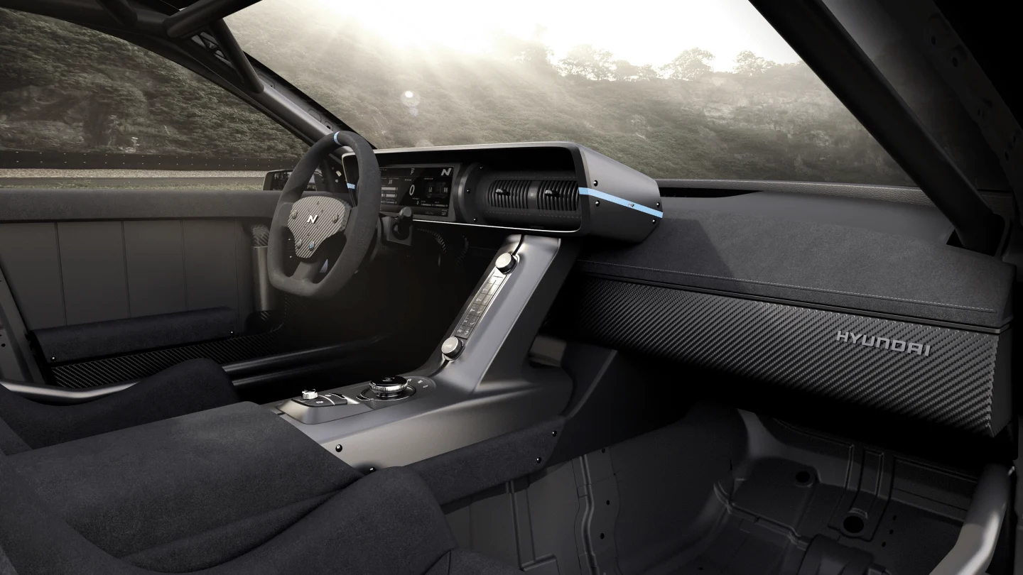 N Vision 74 cockpit with digital instruments, a sculpted centre console and physical controls