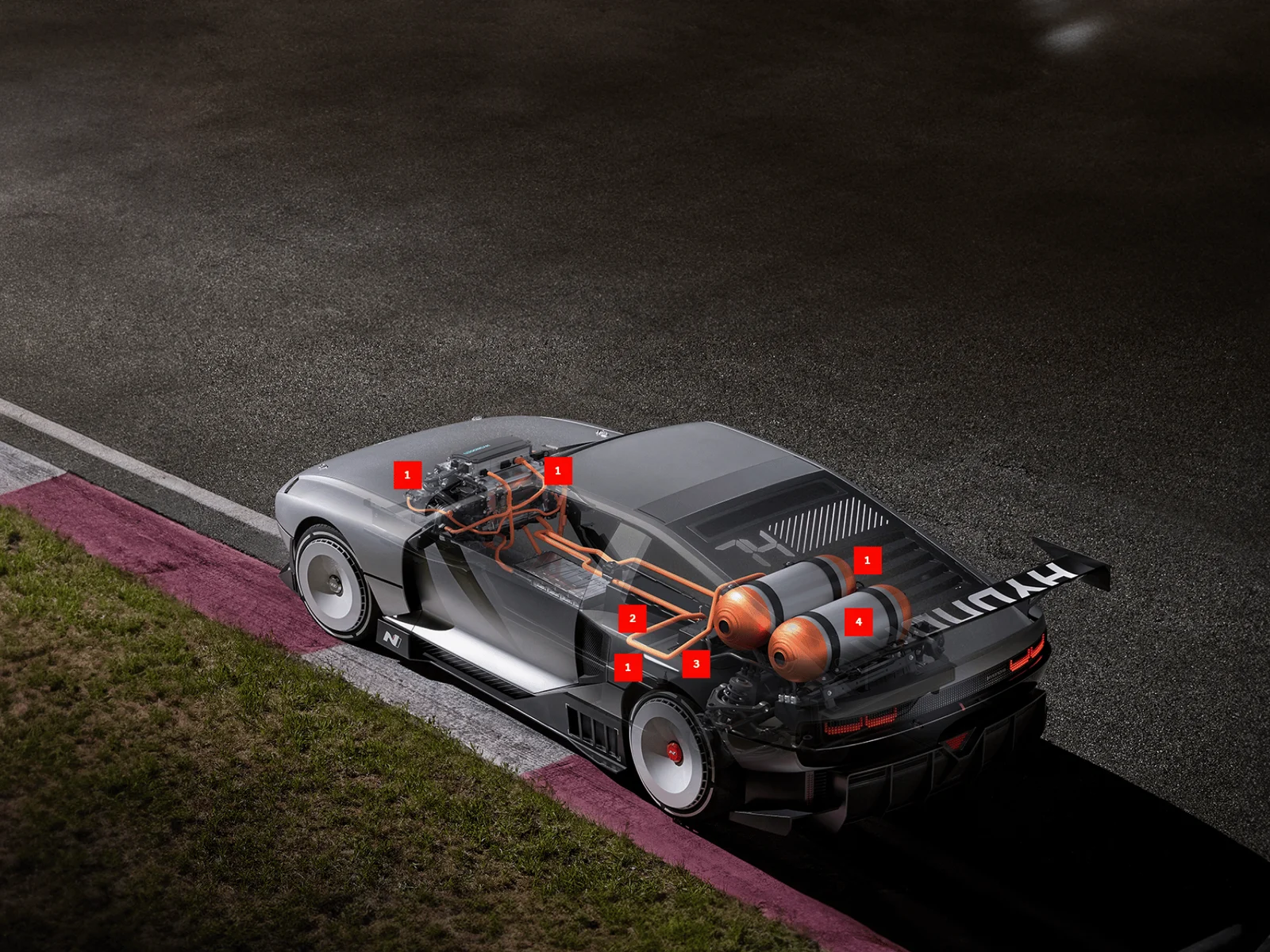 Hyundai cutaway: fuel cell at the front, central battery, rear motors and hydrogen tanks