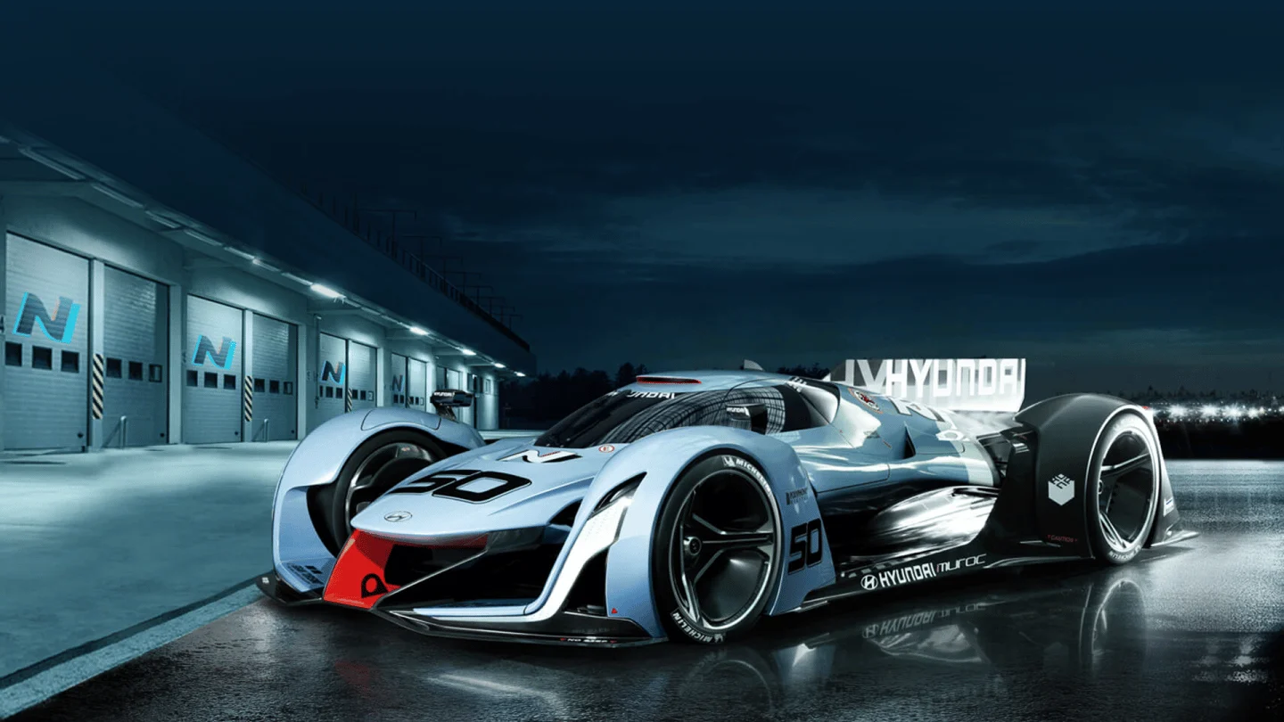N 2025 Vision Gran Turismo hydrogen concept outside a garage